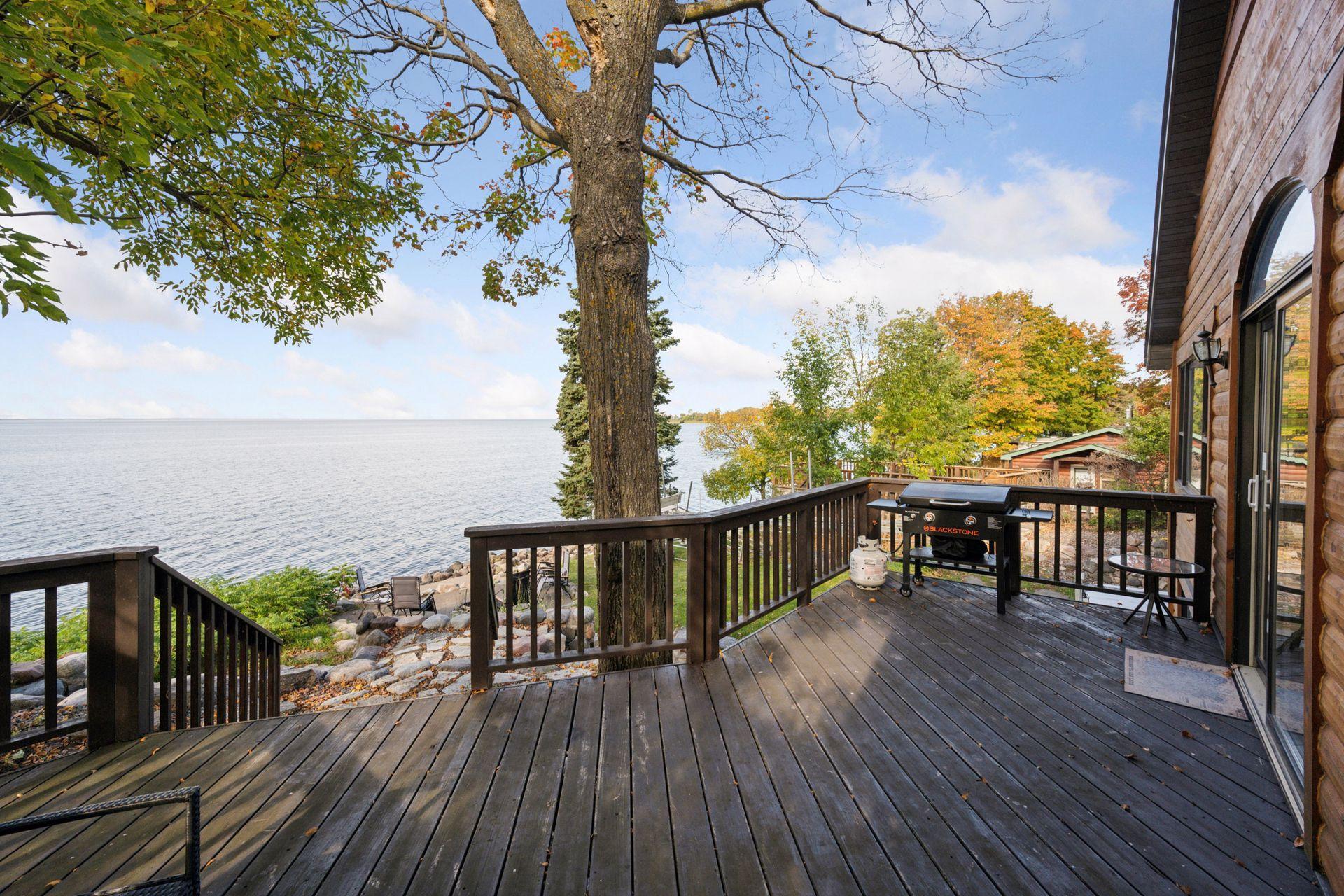 Deck off the Main Floor Living Room Offers Incredible Lake Views