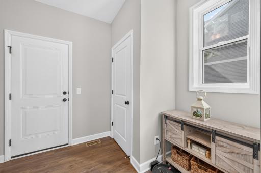 Spacious, Functional Mudroom Entry Designed for Busy Minnesota Living. Bench on Other Side of the Room Will Stay.