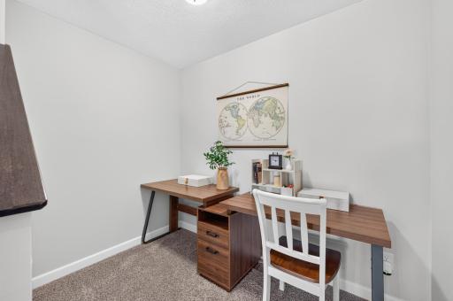Main Floor Office Nook. Desk and Chair Custom Made for Space and Can Stay with the Home.