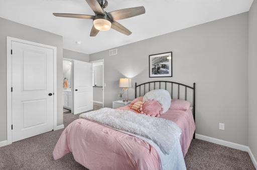 All Bedrooms Feature Walk-In Closets and Ceiling Fans.