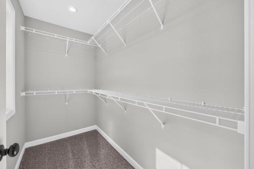 Bedroom 4 Walk-In Closet with Window and Blinds.