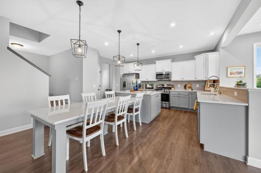 Gorgeous Modern Kitchen with Large Center Island, Quartz Countertops and Walk-In Pantry.