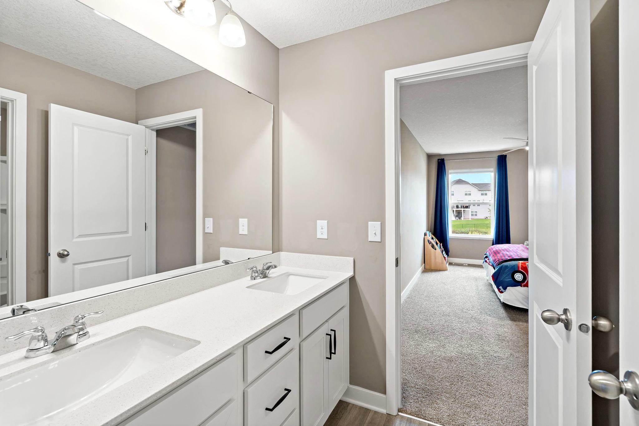 Upper level full bath with double sinks!