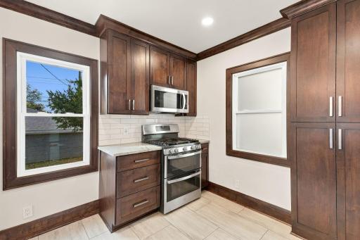 Stainless steel appliances throughout the kitchen.