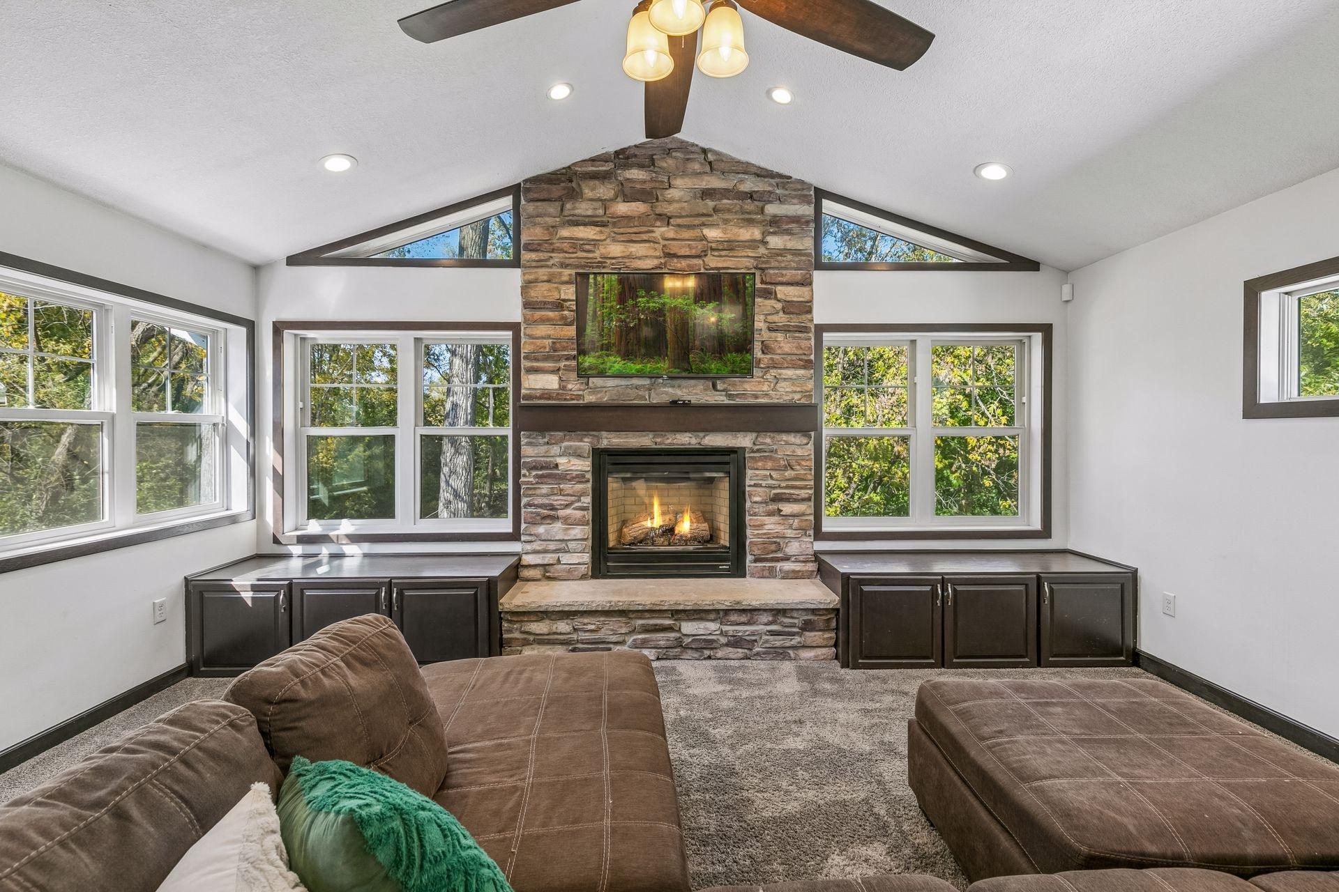 Living Room W/ Vaulted Ceilings & Fireplace
