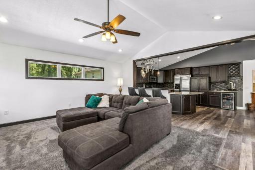 Living Room W/ Vaulted Ceilings & Fireplace