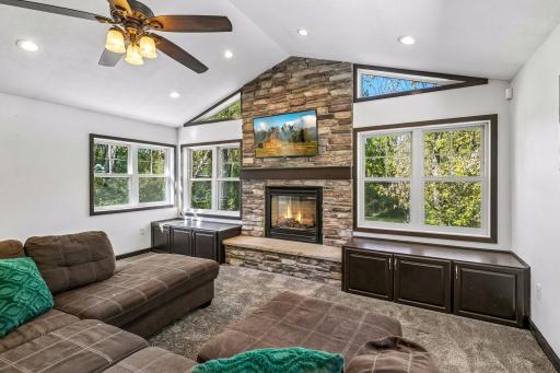 Living Room W/ Vaulted Ceilings & Fireplace