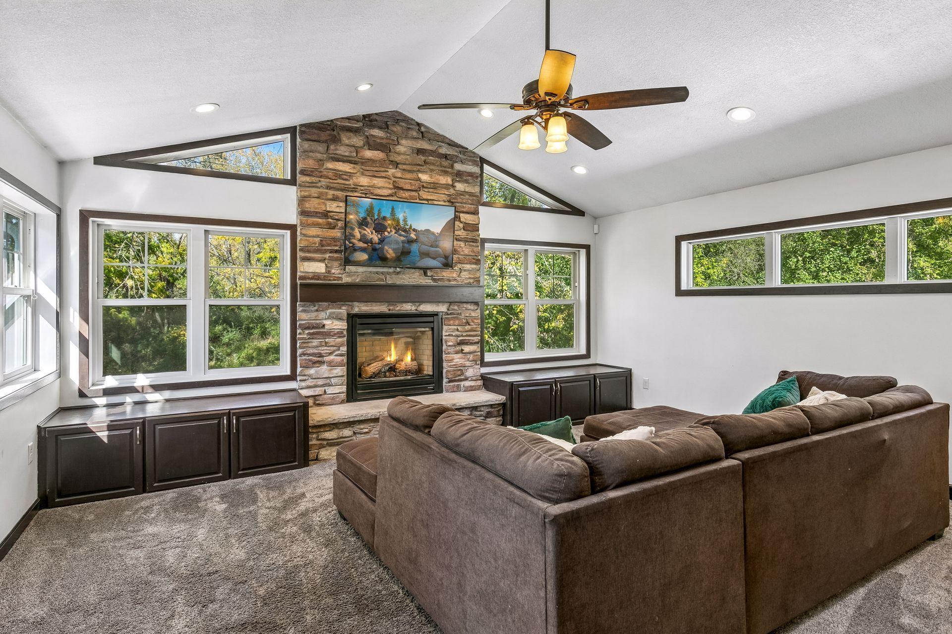 Living Room W/ Vaulted Ceilings & Fireplace