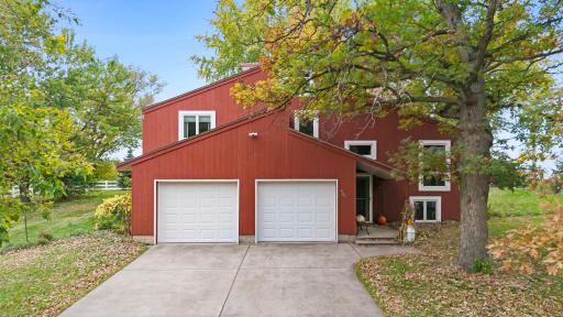 The property includes an existing residence with an attached two-car garage, adding value and flexibility to this expansive land opportunity
