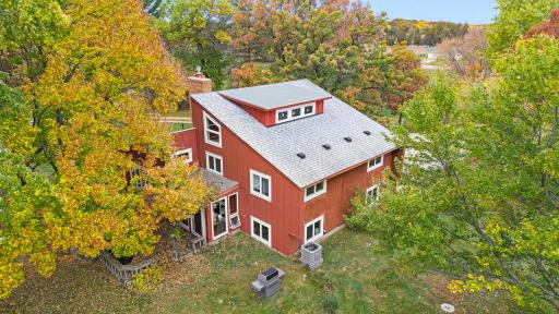 An aerial perspective of the existing home, one of several improvements located on the 104-acre property