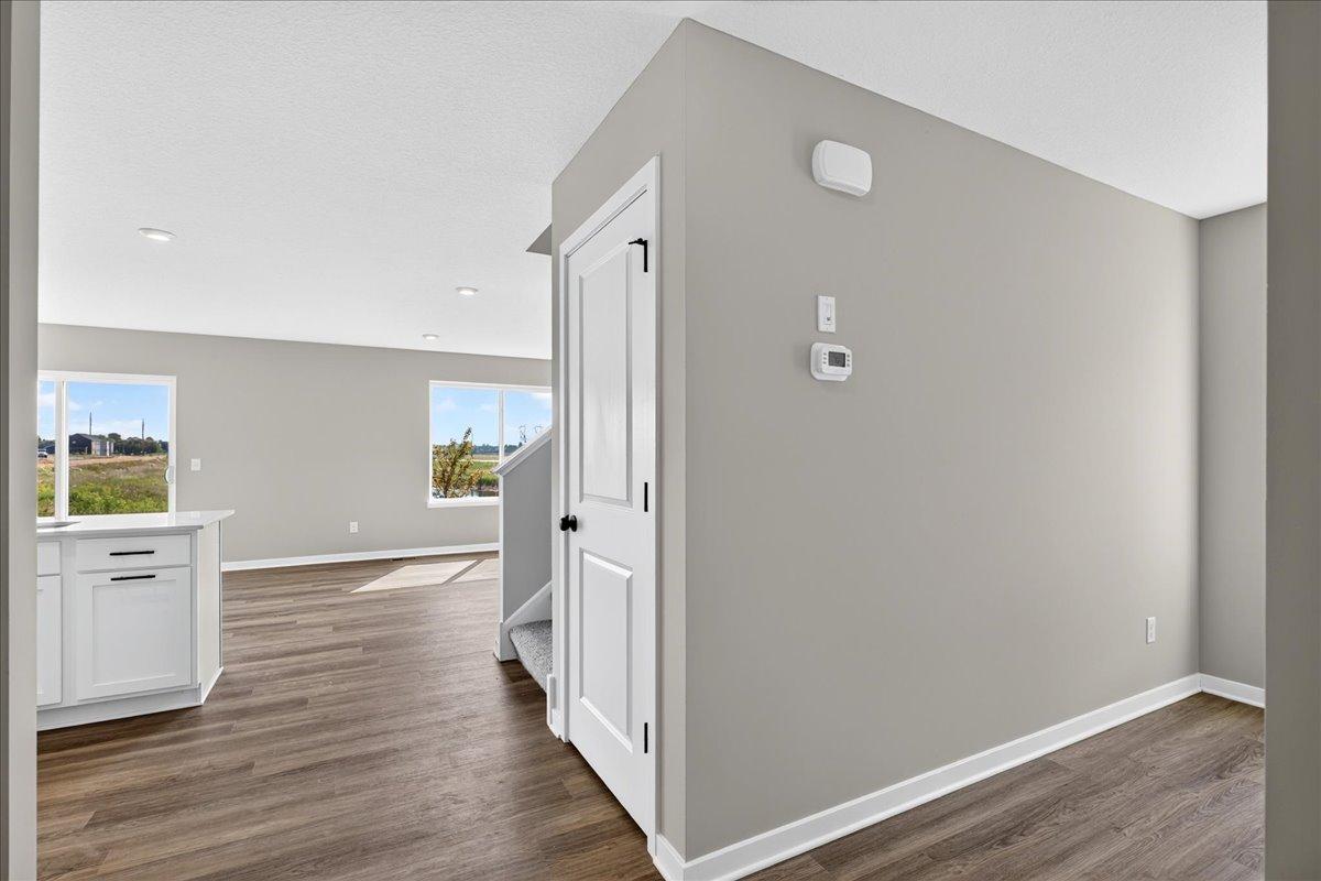 PHOTO OF A DIFFERENT HOME WITH SIMILAR PLAN AND FINISHES.