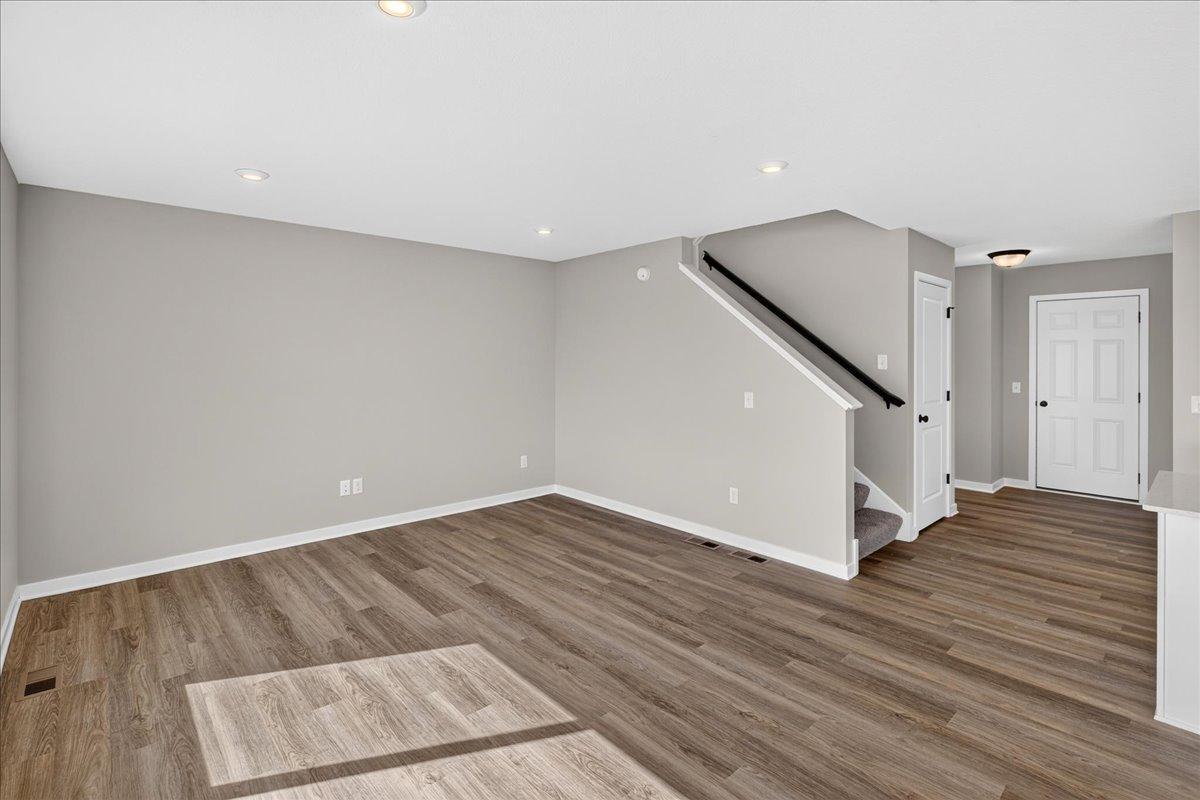 PHOTO OF A DIFFERENT HOME WITH SIMILAR PLAN AND FINISHES.