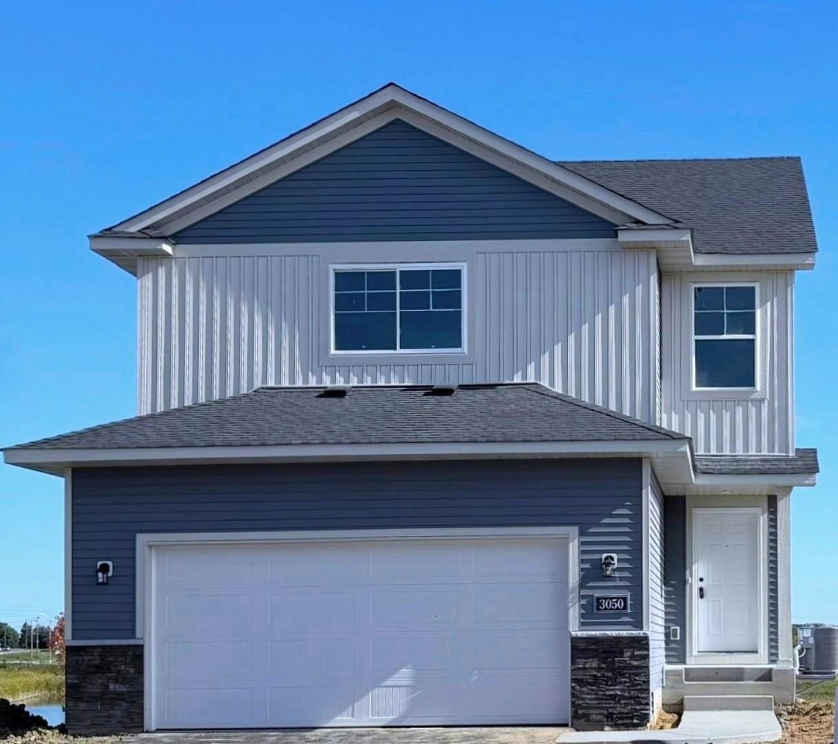 3050 Jandura Ave NE- New Construction Home ready for a November move-in! Highlights include an unfinished walkout lower level ready for future finish. Sod, Irrigation System, and Landscaping included.