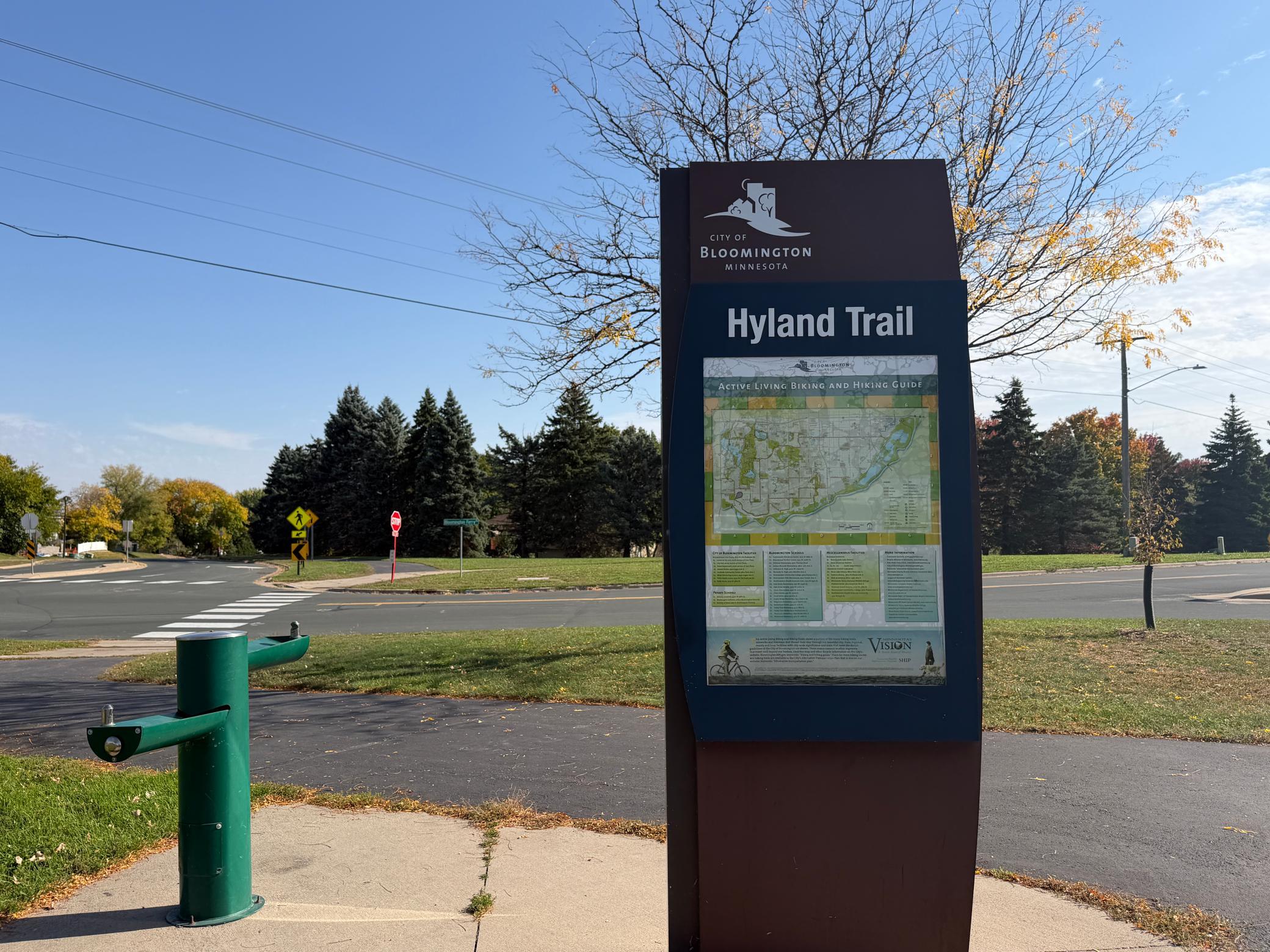 Explore the scenic trails of Hyland Lake Park Reserve in Bloomington, featuring beautiful wooded paths, rolling hills, and peaceful natural surroundings—perfect for walking, biking, and outdoor recreation.