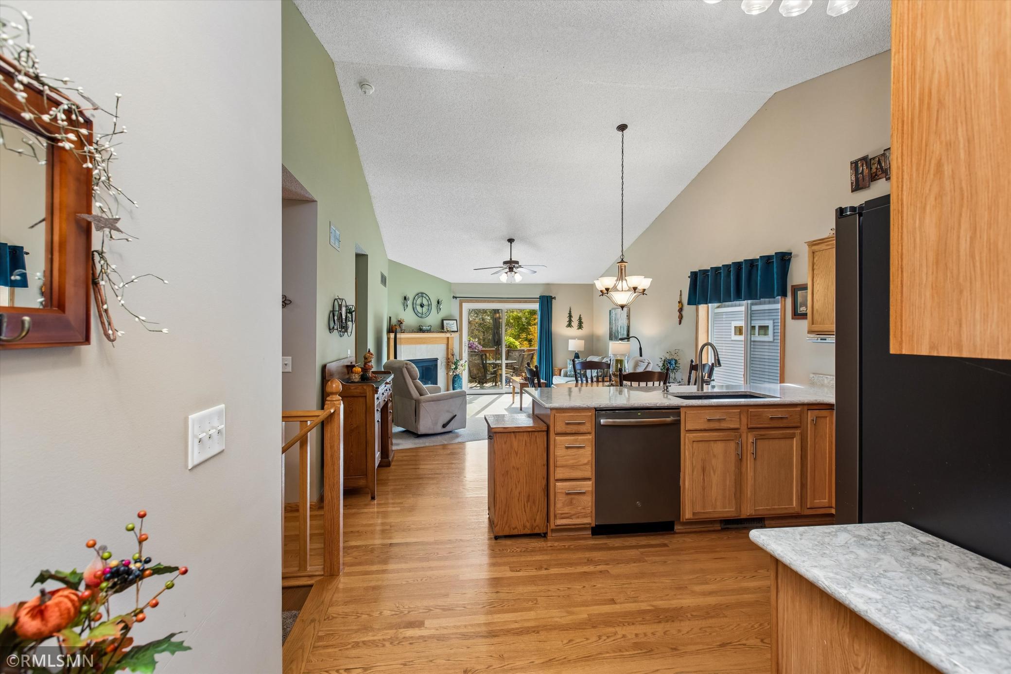 Hardwood flooring in the entryway, kitchen, dining and back entryway