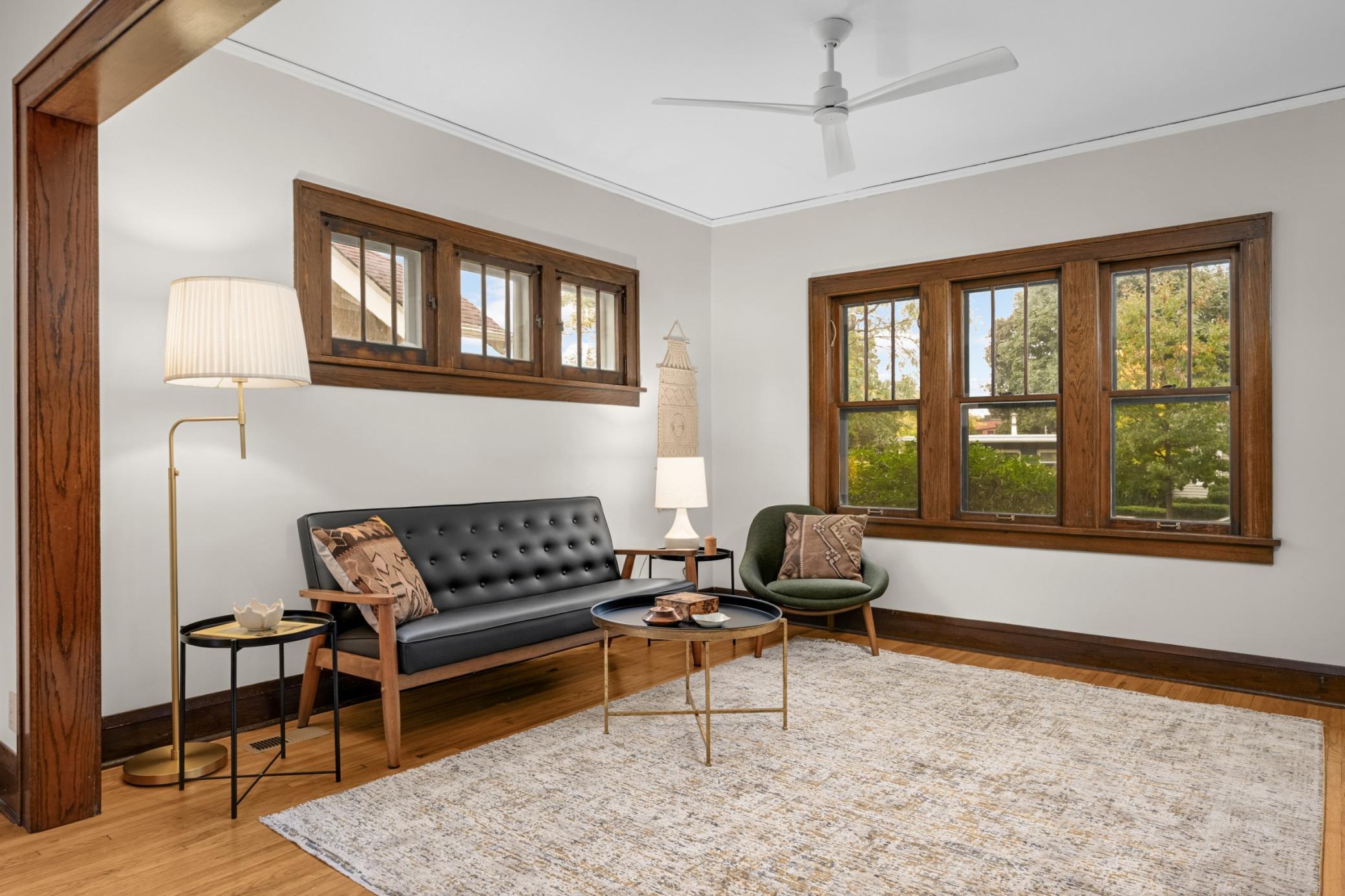 Great natural light in the living room and a new ceiling fan.