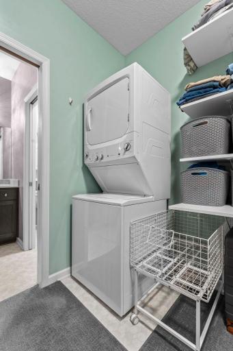 Washer and dryer located in the primary bedroom closet for convenience!
