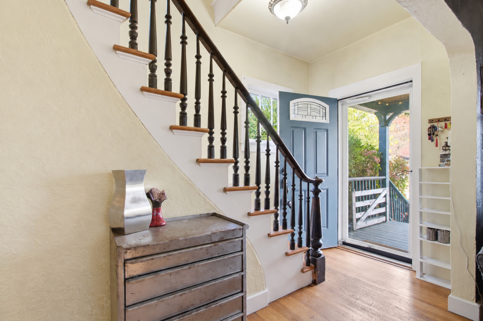 Entry - original hardwood floors to welcome you.