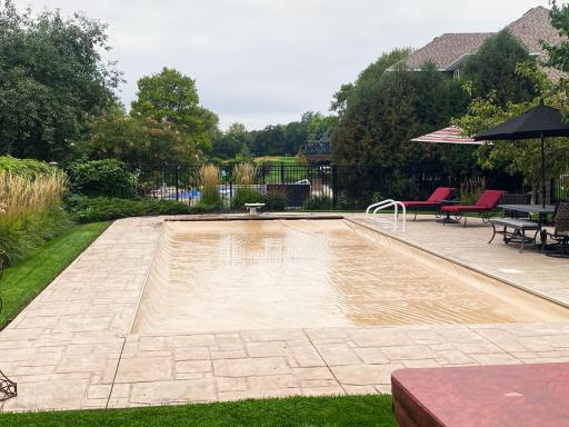 Client provided photo from this summer - The Pool comes with an automated pool cover