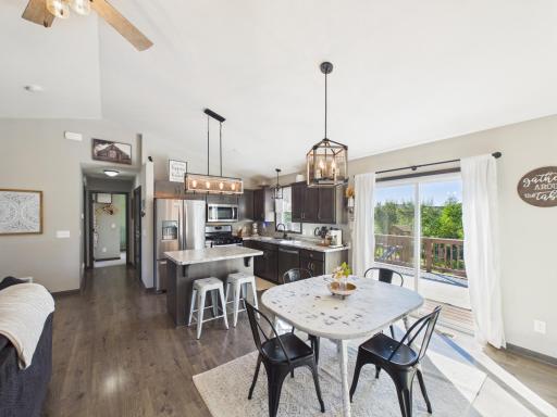 Functional kitchen & dining layout w/ access to the deck & backyard