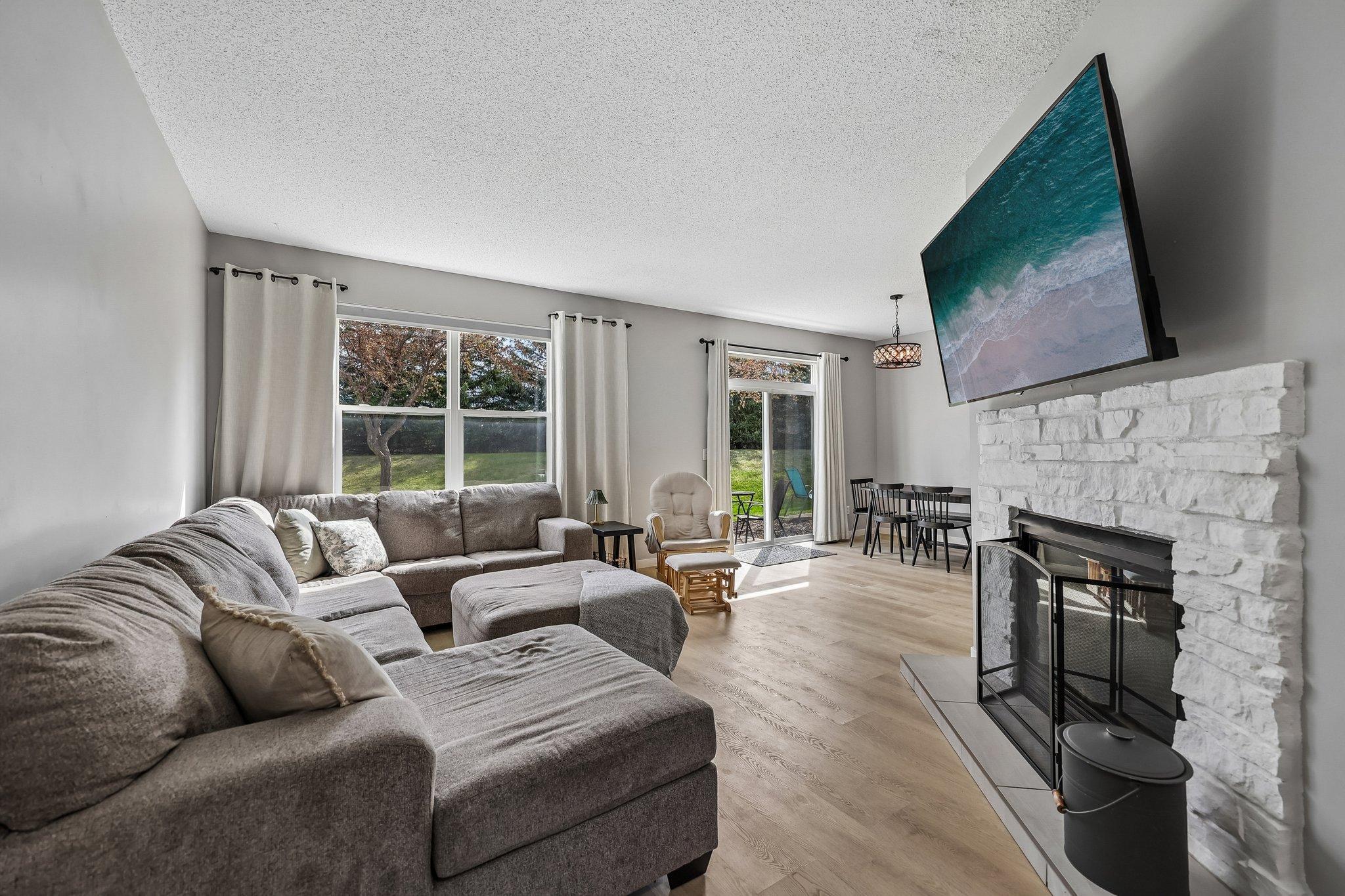Living Room Opens to Dining Room and Walk Out Patio