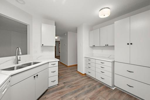 Wonderful mix of drawers and cabinets. Super efficient use of space.