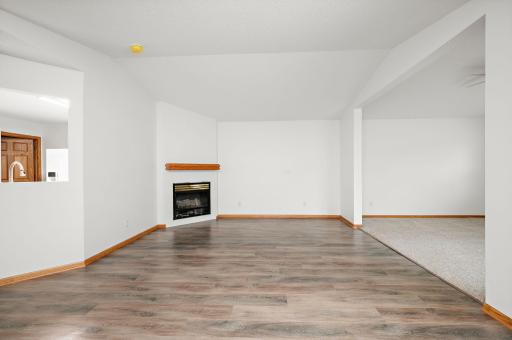 Cozy gas fireplace will warm up this space nicely for the coming cold months.