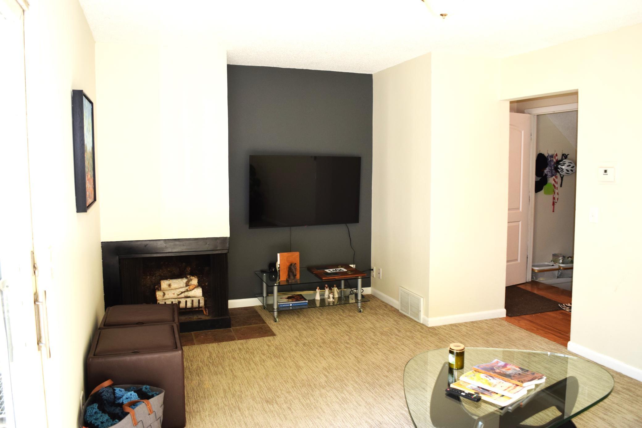 Unit 1 Cozy up to the wood burning fireplace on those chilly autumn and winter nights!