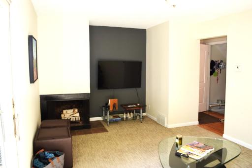 Unit 1 Cozy up to the wood burning fireplace on those chilly autumn and winter nights!