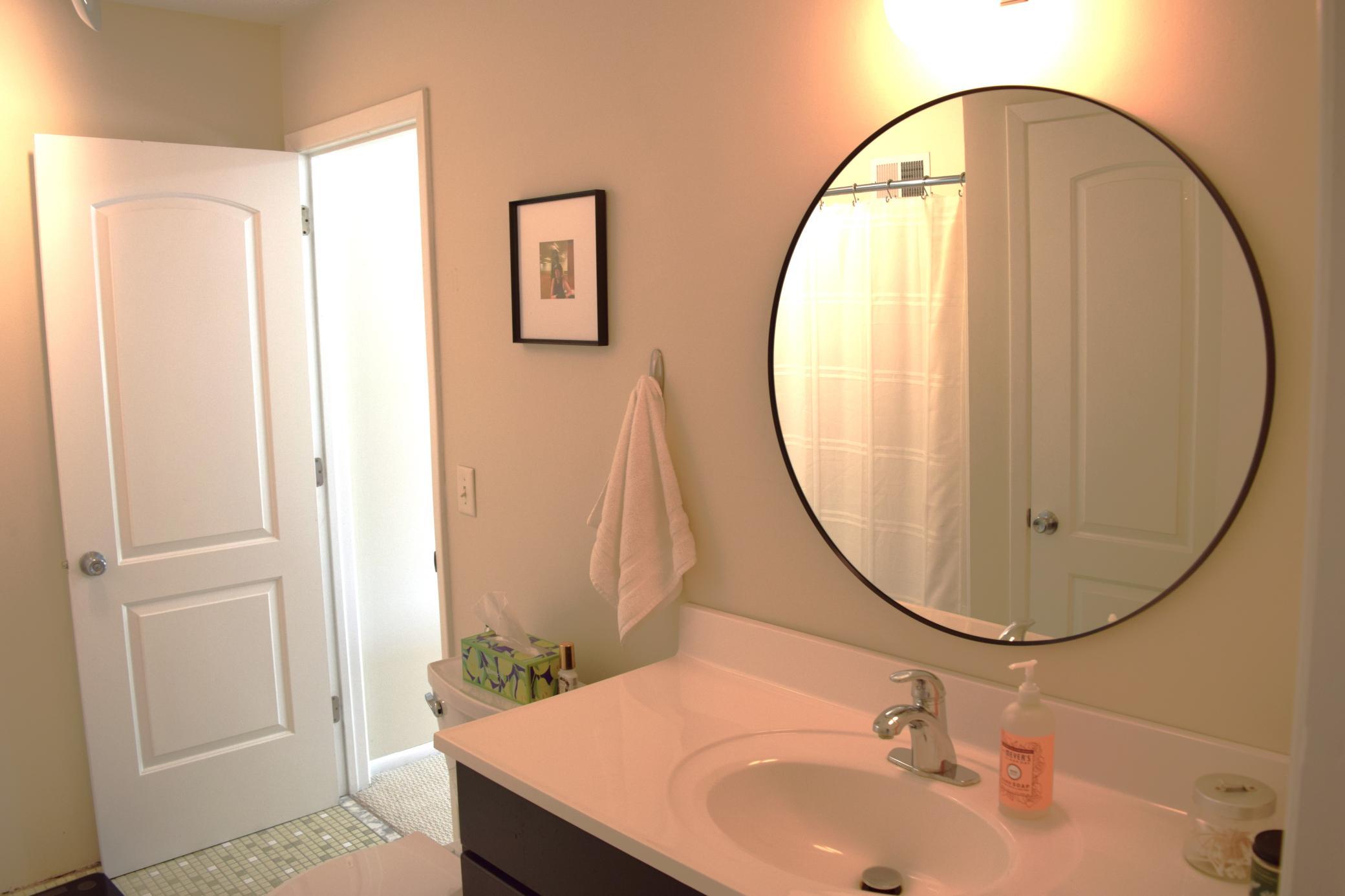 Unit 1 upper level bath. Three of the four toilets in this property were replaced in 2026!