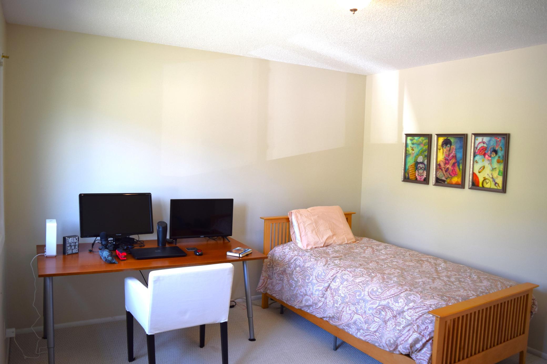 Unit 1 Upper level bedroom.