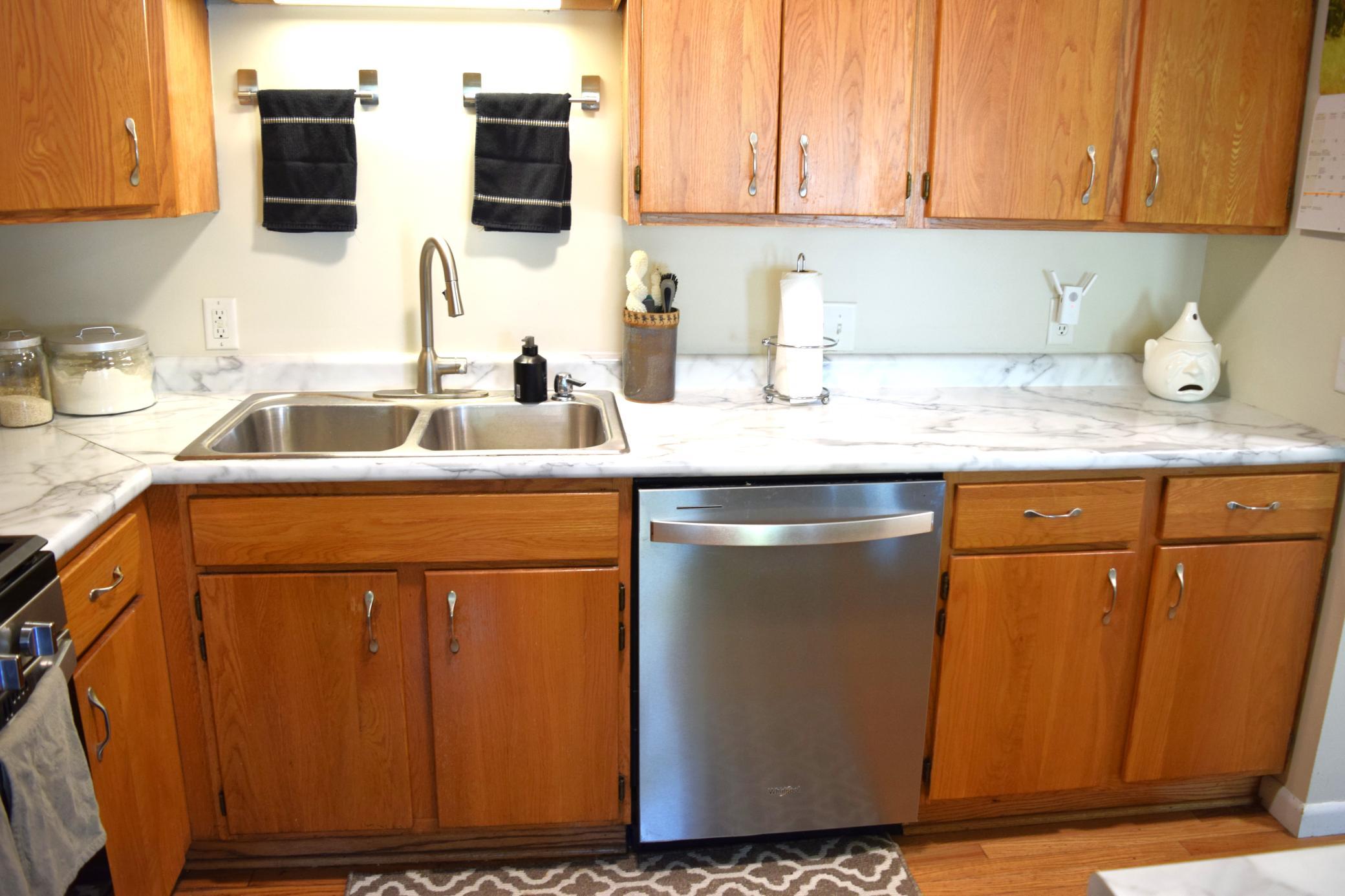 Unit 1 Dishes are a breeze with the double-sided sink and dishwasher!