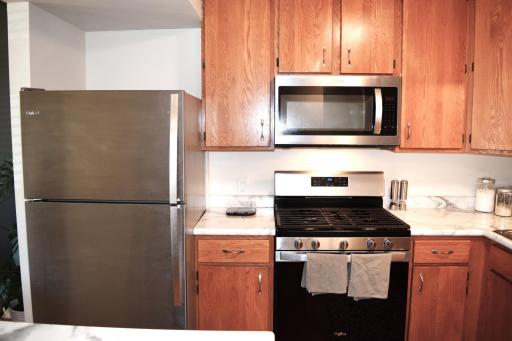 Unit 1 The newer stainless steel appliances and updated countertops!