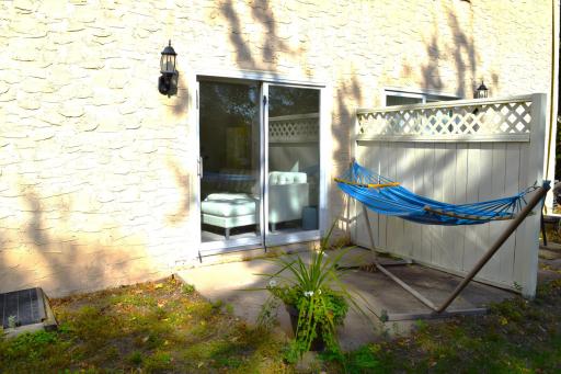 Enjoy an ice cold lemonade as you relax in the hammock on the private patio! A great place for summer night barbecues and dining alfresco!