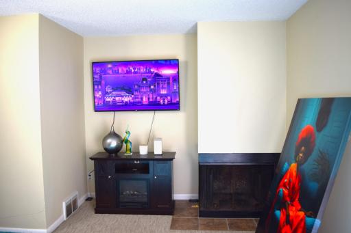 Unit 2 Living room with wood burning fireplace!