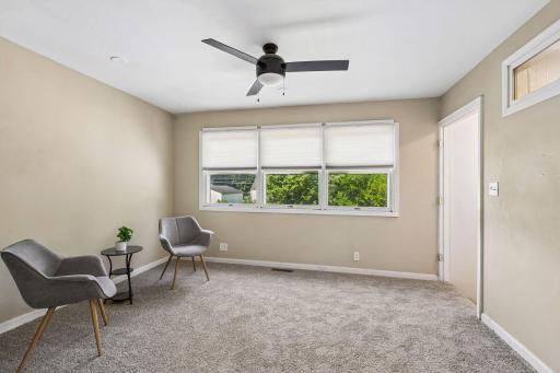 Great upper level flex space offers many possibilities! Office/craft/play/reading