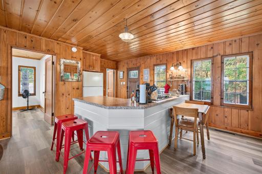 Another view of the kitchen and dining area