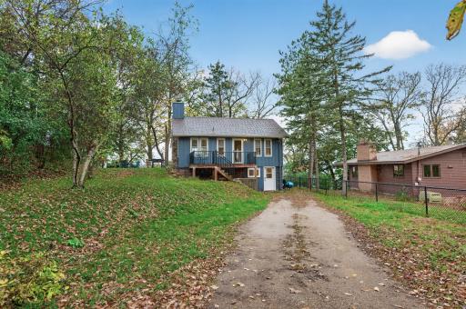Year-round cabin with new roof and steel siding.