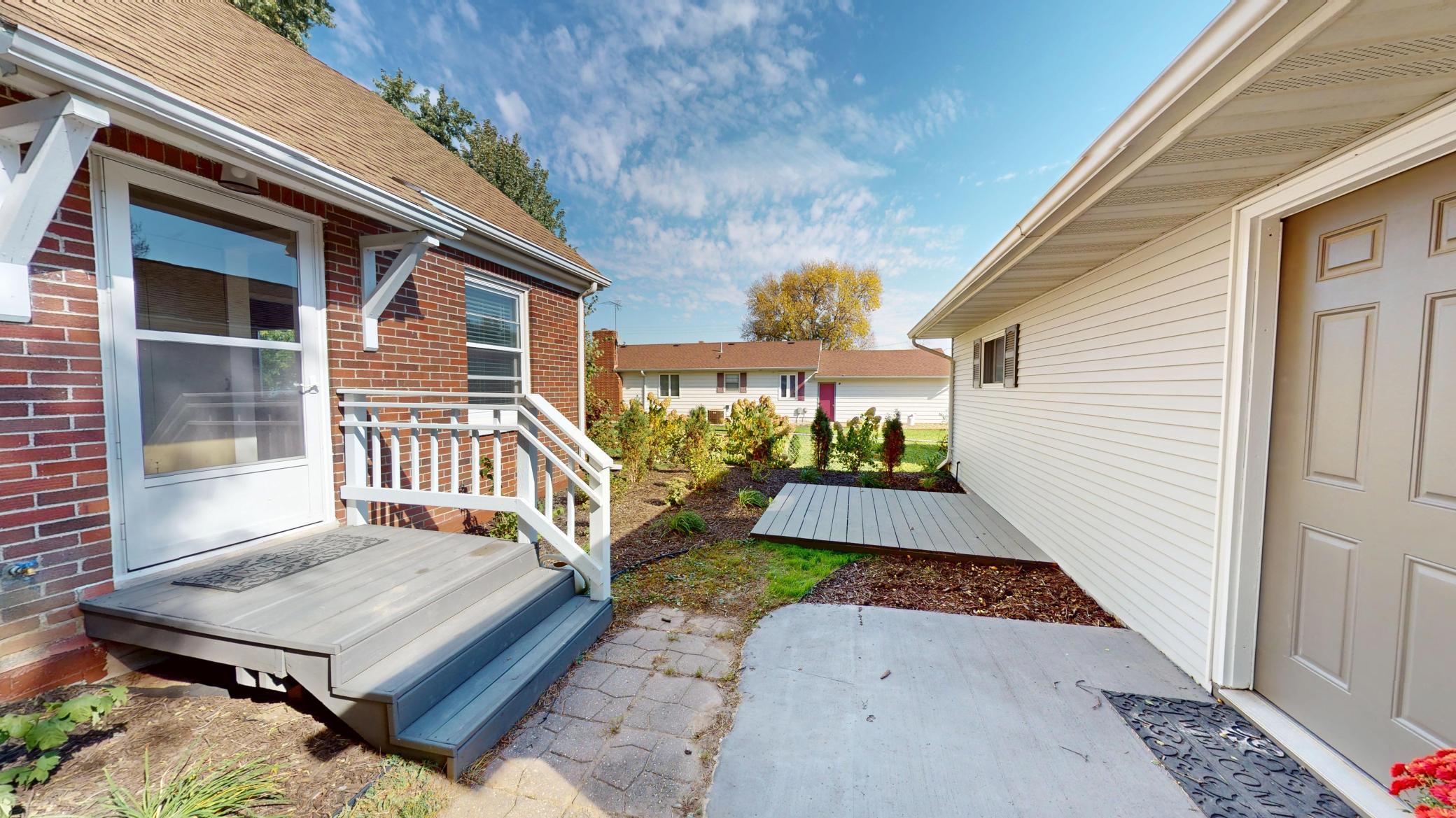 Between house and garage