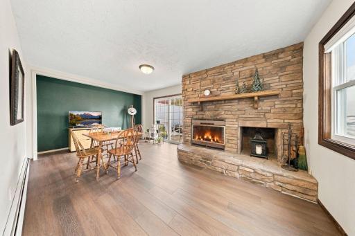 Additional living area with a wood-burning fireplace.