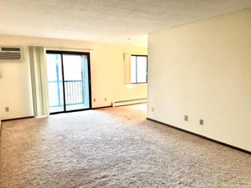 Living room walks out to private screened porch