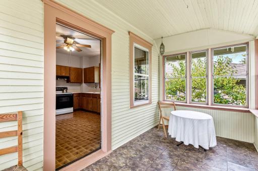 Step right off the kitchen out to the sunny east facing back porch