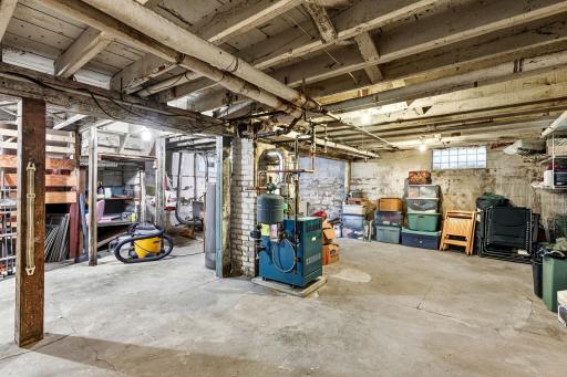 Basement features comfortable headroom and plentiful of storage space