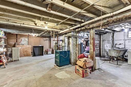 Basement features comfortable headroom and plentiful of storage space