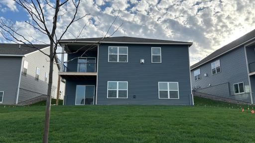 Spacious yard. HOA maintained lawn and snow removal. Charming, covered deck + walkout basement!