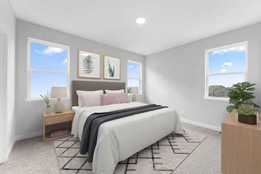 Primary suite. Spacious main floor bedroom with walk-in closet and private bath.