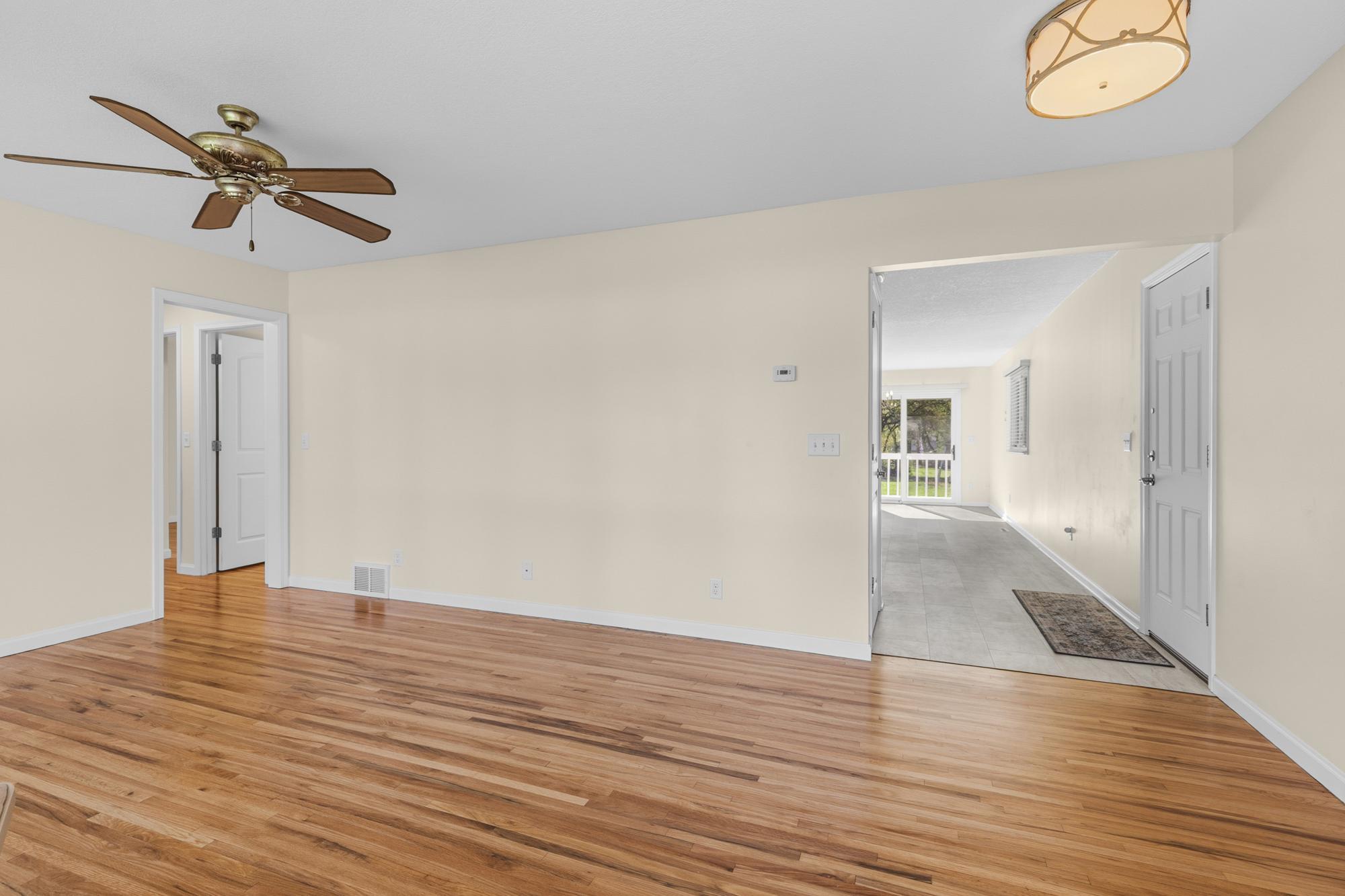 Upon entry, Your Living Room greets you with handsome narrow plank oak floors.