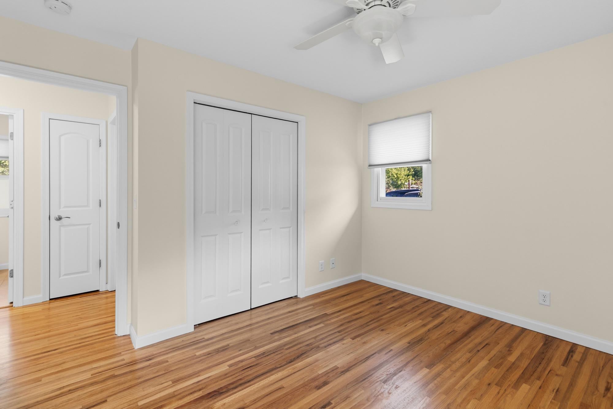 Primary Bedroom Closet. Note the paneled doors.