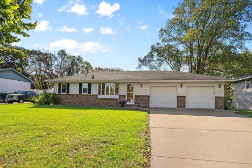 Brick and aluminum for a maintenance-free exterior plus a Concrete Driveway.