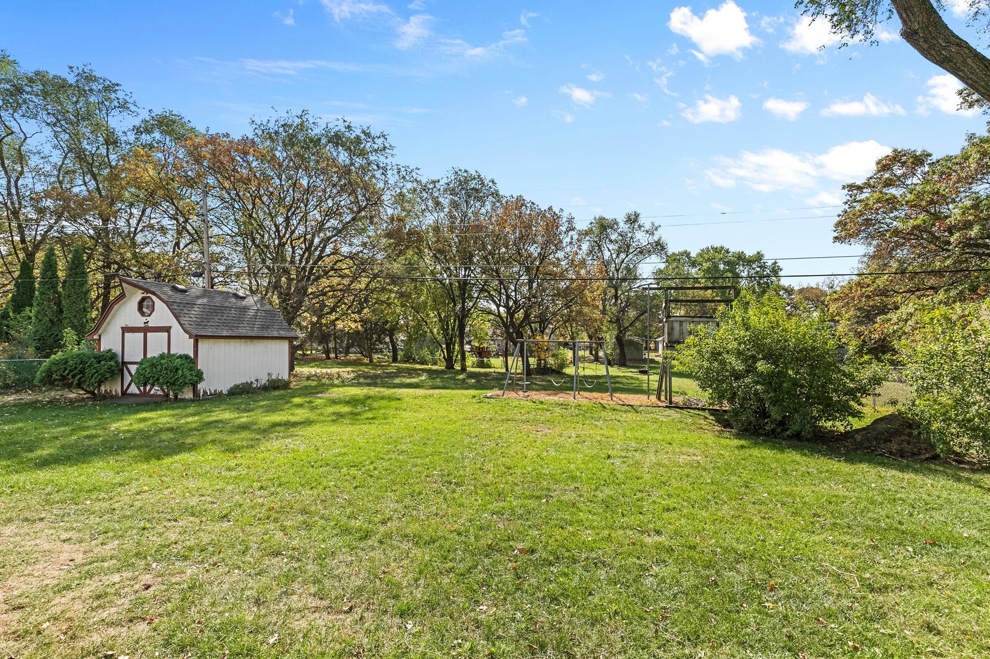 Your back yard with a convenient Shed, 12 x 13, with a floor, skylight, loft and electric.